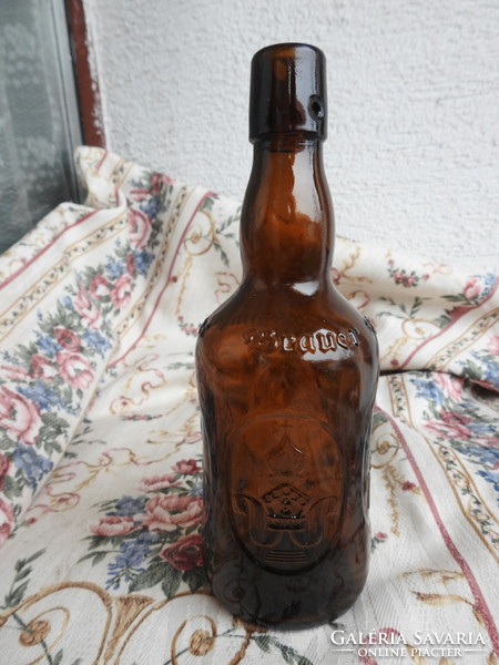 Embossed old beer bottle ultenmunsten brauen bier bottle
