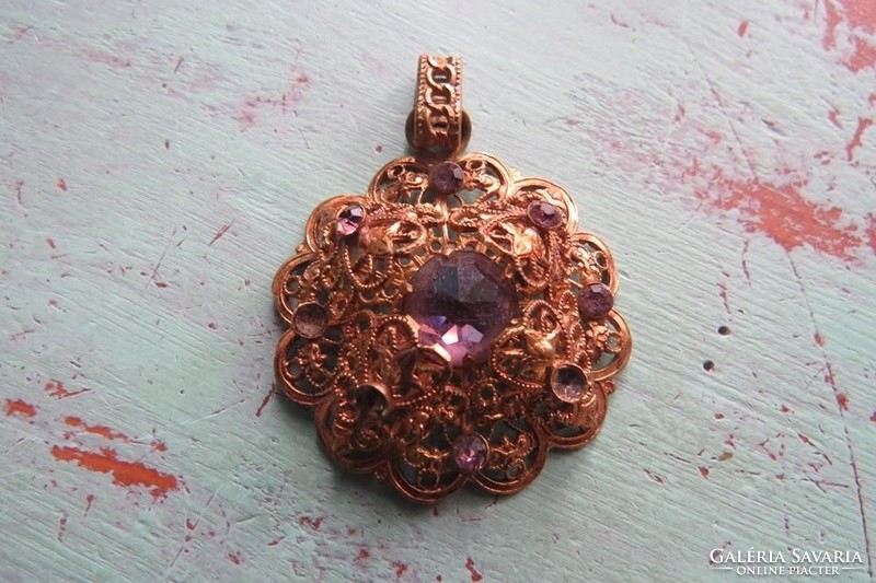 Beautiful filigree vintage pendant with purple glass inlay