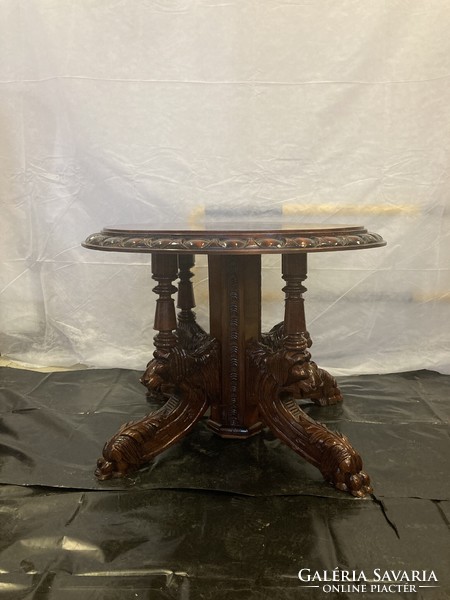 Richly carved eclectic style table