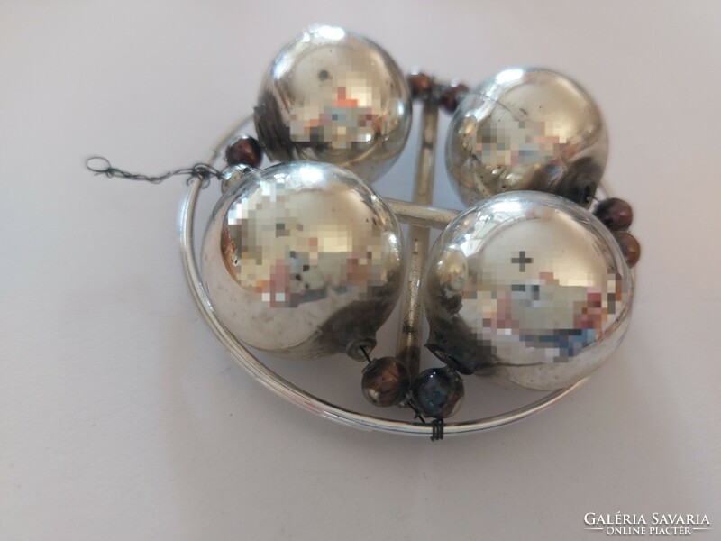 Old glass Christmas tree decoration with silver glass ornament