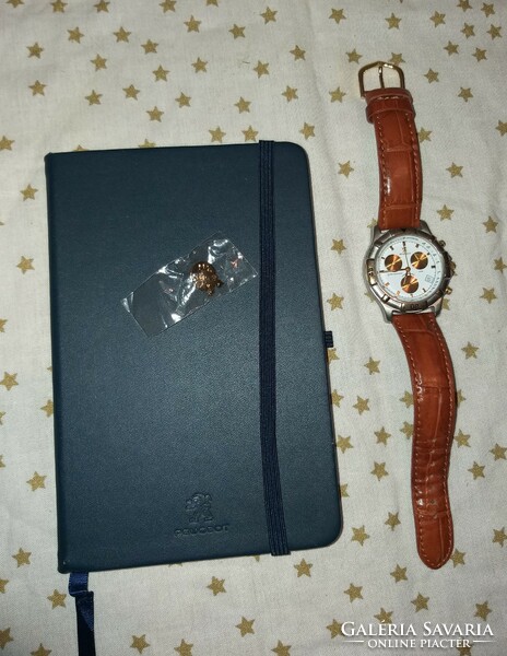 Peugeot watch, badge, notebook