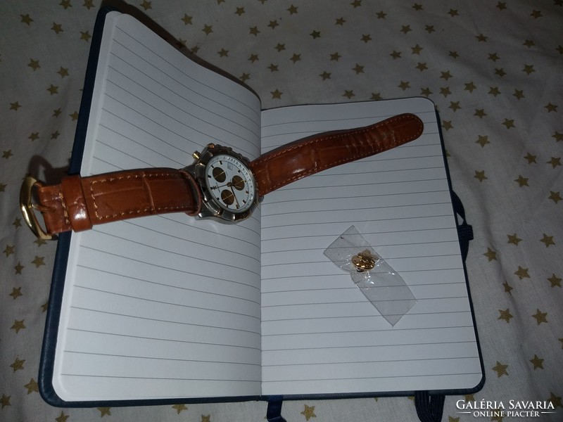 Peugeot watch, badge, notebook