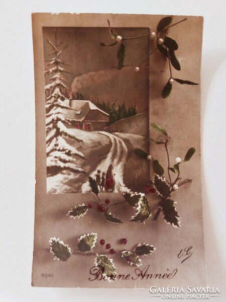 Old Christmas postcard postcard snowy landscape with mistletoe