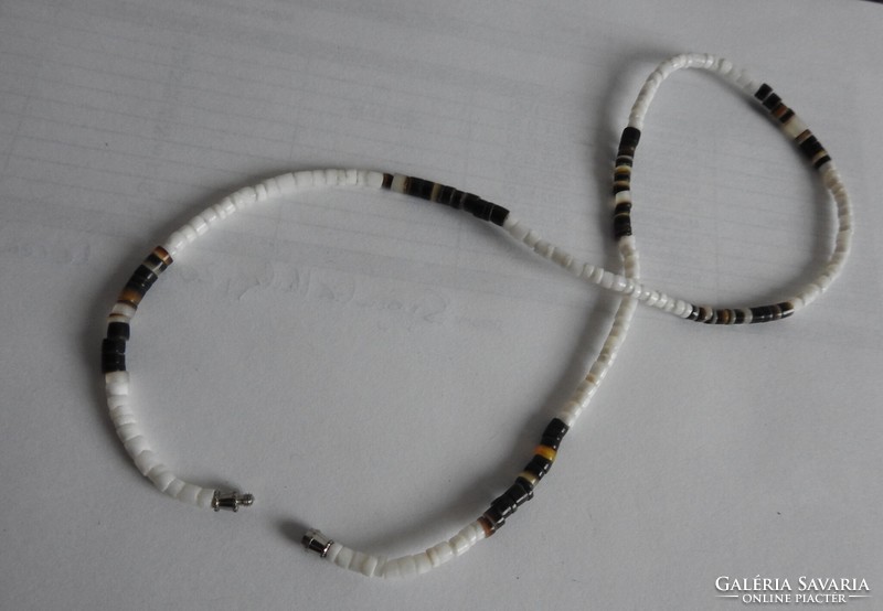 White - black string of pearls