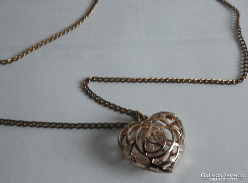 Gold-plated heart coin on a chain