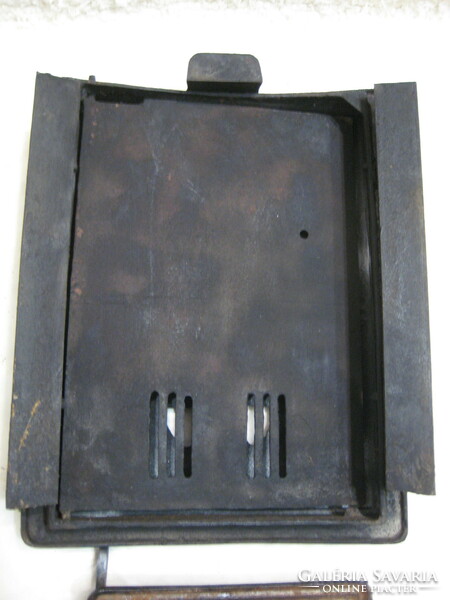 Large cast iron, tile stove, stove door