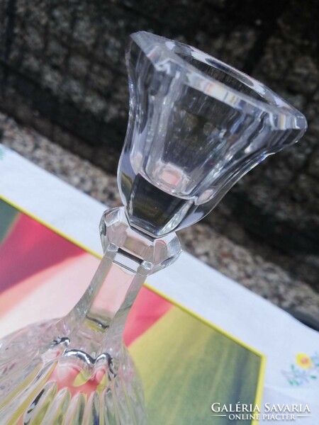 A fabulous candle holder and vase with rich polishing