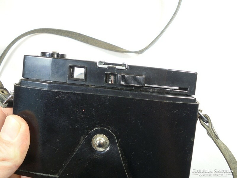 Retro old camera in a camera case - cmeha smena symbol - Soviet, Russian made