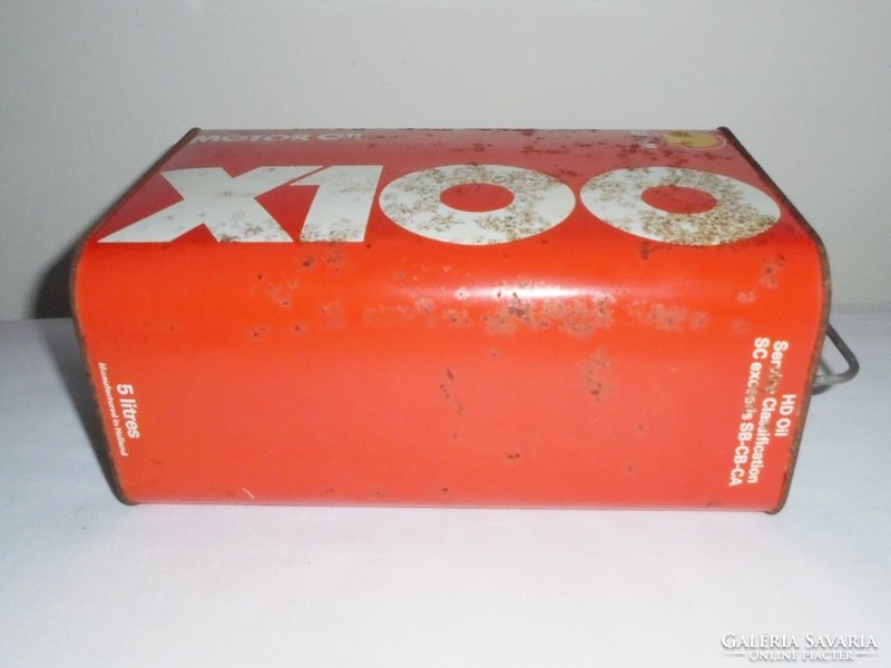 Retro shell x100 oil can - car car motor oil oil gasoline gas station advertisement - 1970s