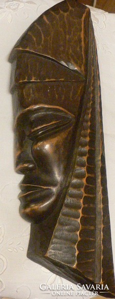 Carved head made of wood in 1973