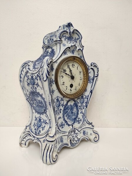 Antique clock, furniture clock Delft Delft porcelain in a half-baked structure 305 6206