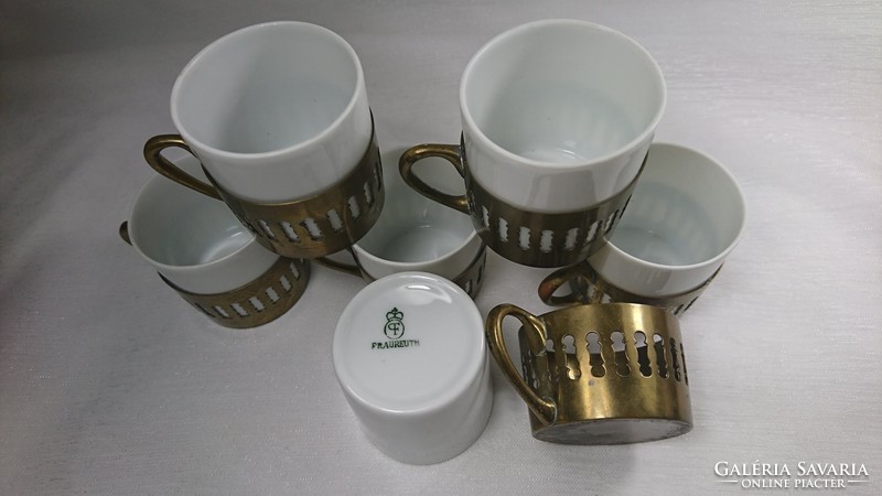 Fraureuth German porcelain glasses with pierced copper insert. In terms of their function, coffee cups