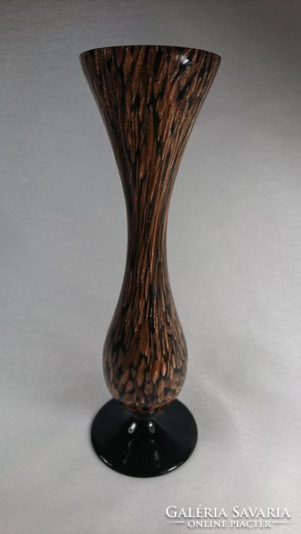 In the second half of Xx.Szd a glass vase decorated with a gold pattern on the outside was made on a black background