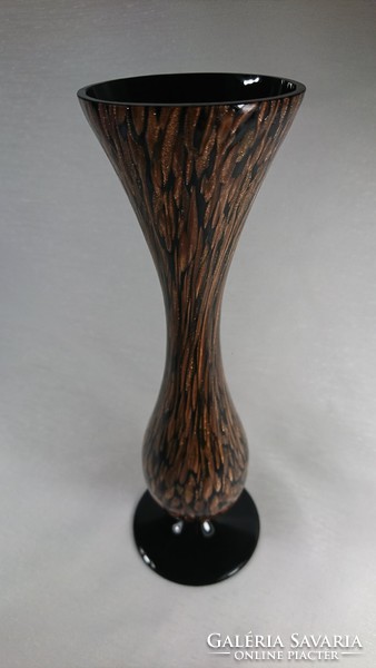 In the second half of Xx.Szd a glass vase decorated with a gold pattern on the outside was made on a black background