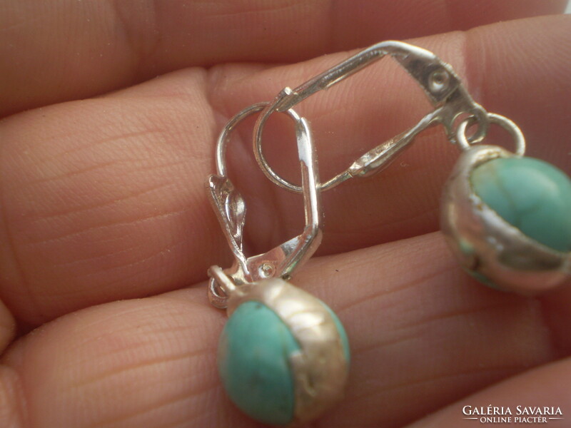 Cute earrings with turquoise sockets