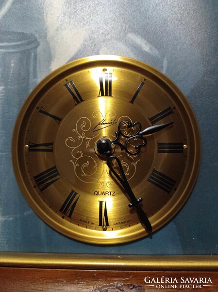 Retro German wall clock, under glass in a frame