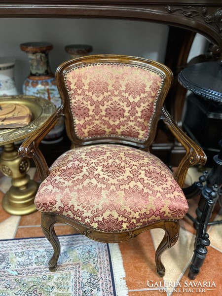 Antique neo-baroque style women's armchair with beautiful upholstery