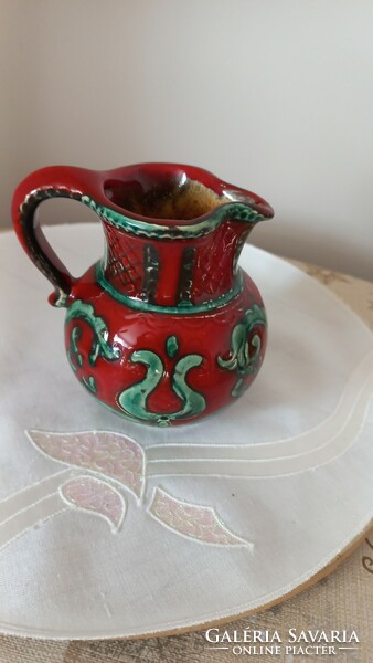 Gmunder antique small ceramic pourer, burgundy green with folk pattern. Hand painted, marked