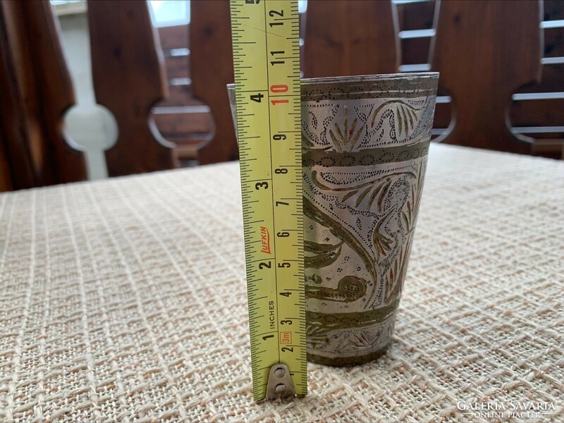 Old Indian handcrafted copper cup with meticulously decorated engraved pattern