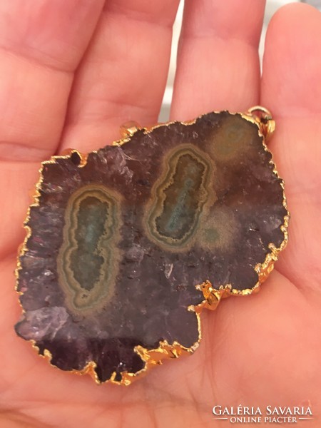 Amethyst-agate geode slice pendant in a gilded metal frame