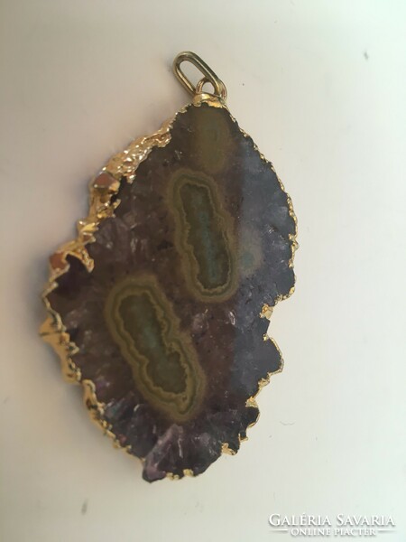 Amethyst-agate geode slice pendant in a gilded metal frame