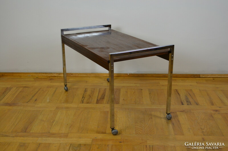 Mid-century rolling coffee table with chrome frame