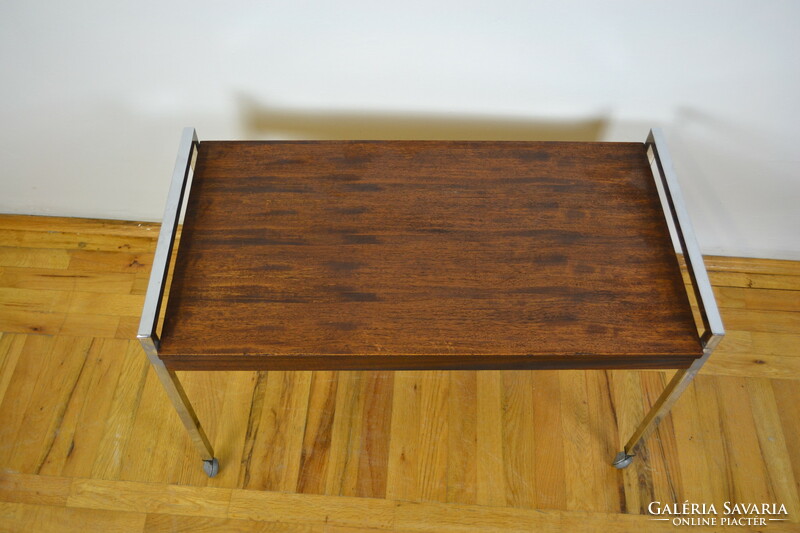 Mid-century rolling coffee table with chrome frame