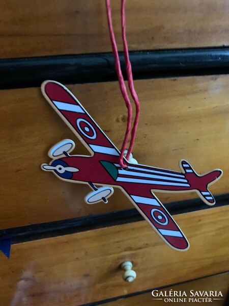 Christmas tree decorations in one, airplane and 2 boxes of fringe