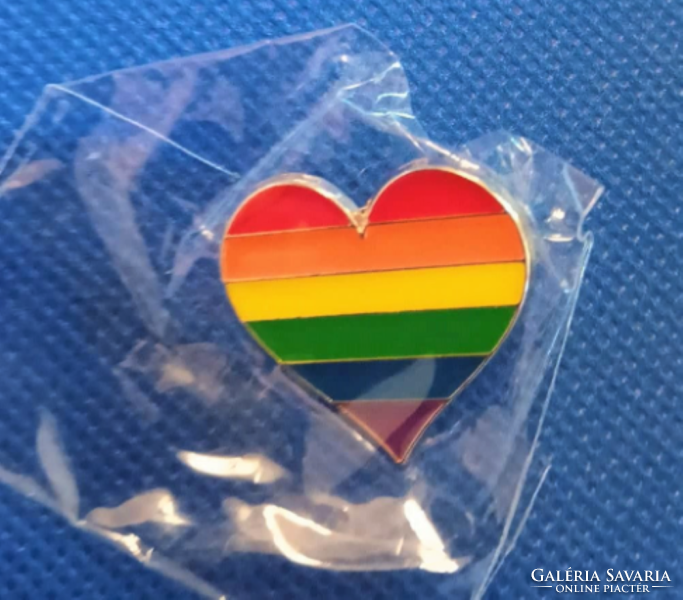 Pride heart pin in original package. Made of alloy in mulicolour