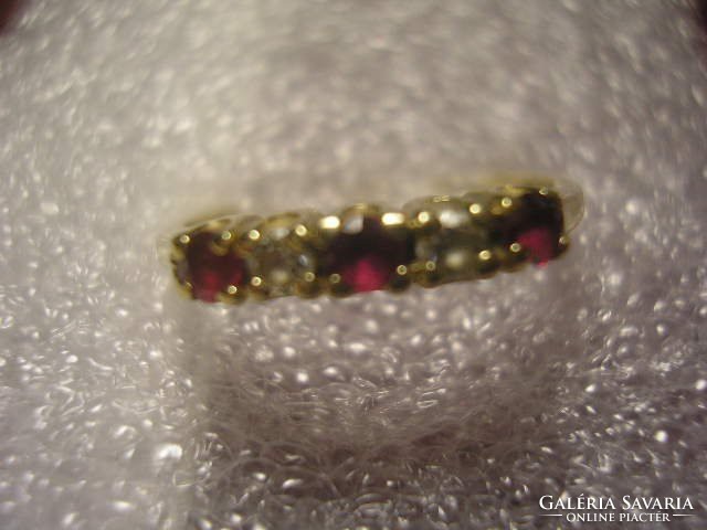 And e5 masterpiece gold ring with 3 rubies + 2 zirconia stones + more gold items