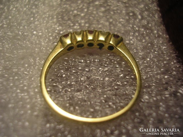 And e5 masterpiece gold ring with 3 rubies + 2 zirconia stones + more gold items