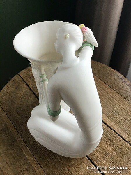 Handmade oriental biscuit porcelain vase with a female figure