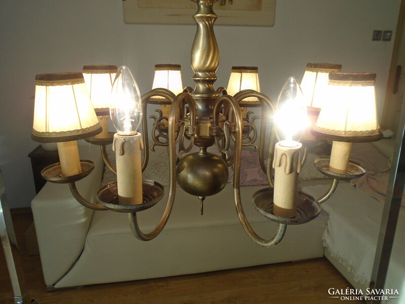 Nice old eight arm Flemish bronze chandelier and a matching wall arm
