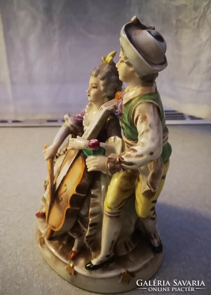 Beautiful colored painted porcelain musician pair, wagner & apel rococo pair. Gdr indicated. Video too!