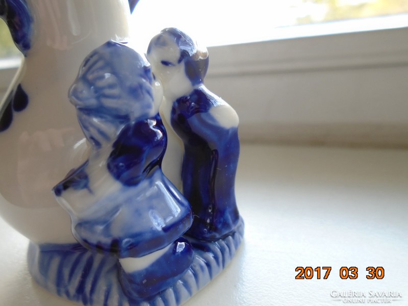 Small vase with children's figures painted in cobalt blue under the glaze