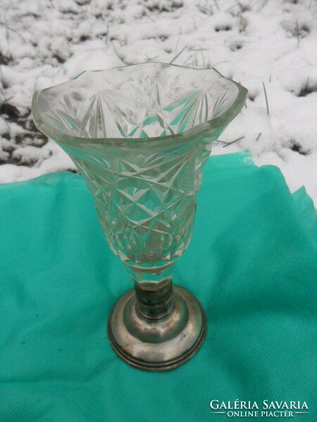 Polished glass vase with silver base