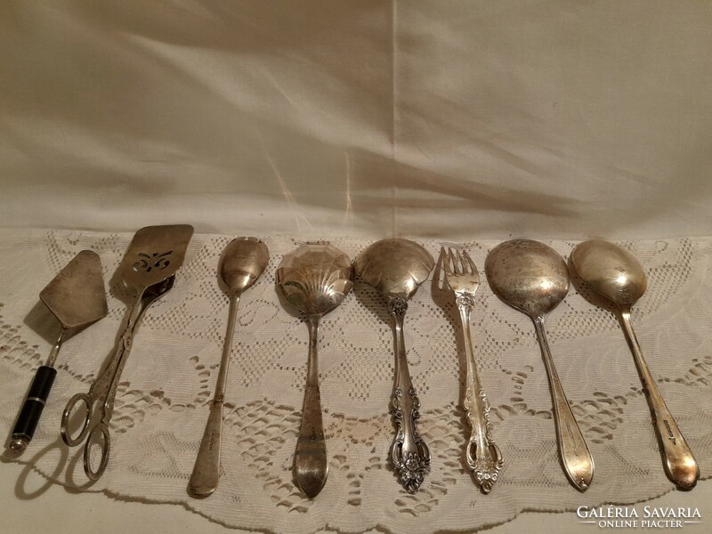 Metal marked serving cutlery in one