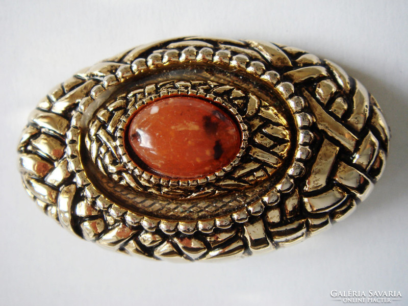 Old women's brooch with vintage badge