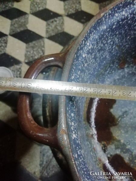 Antique iron pot is in the condition shown in the pictures