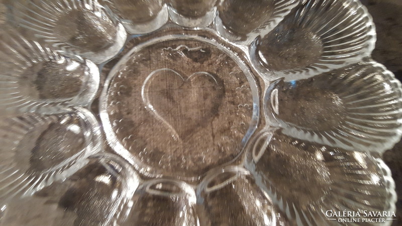 Heart-shaped, bird-like glass egg holder, offering bowl