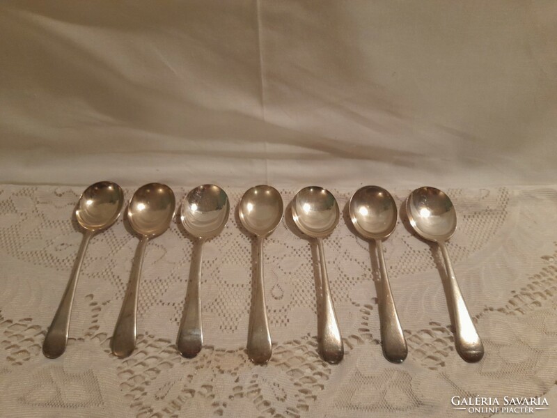 Metal marked spoons in one