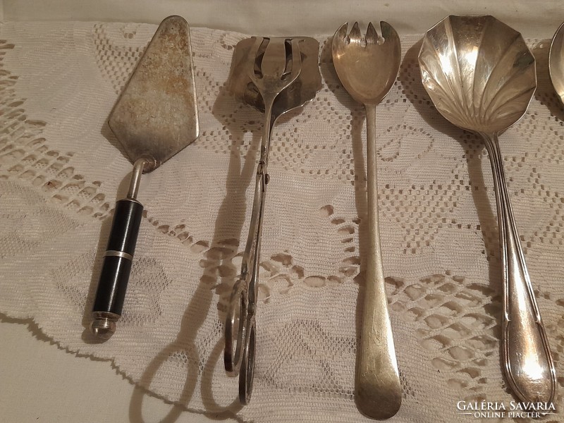 Metal marked serving cutlery in one