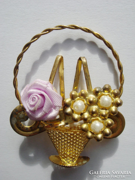 Old women's brooch with vintage metal badge