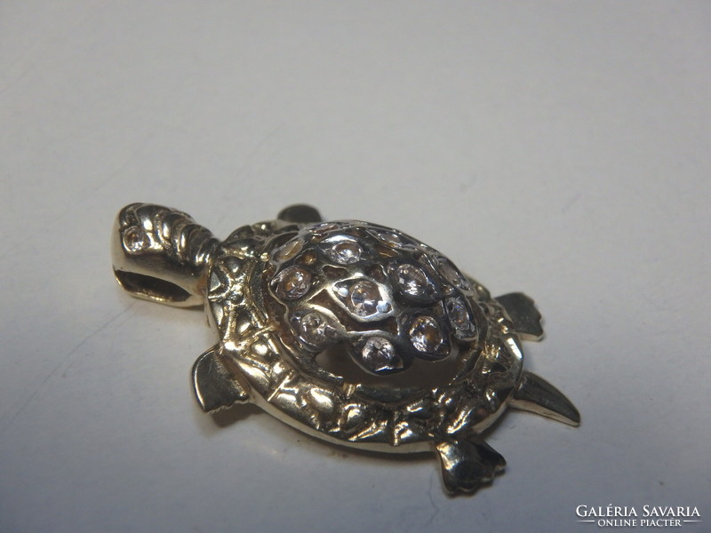 14K bicolor gold turtle pendant with zirconia.