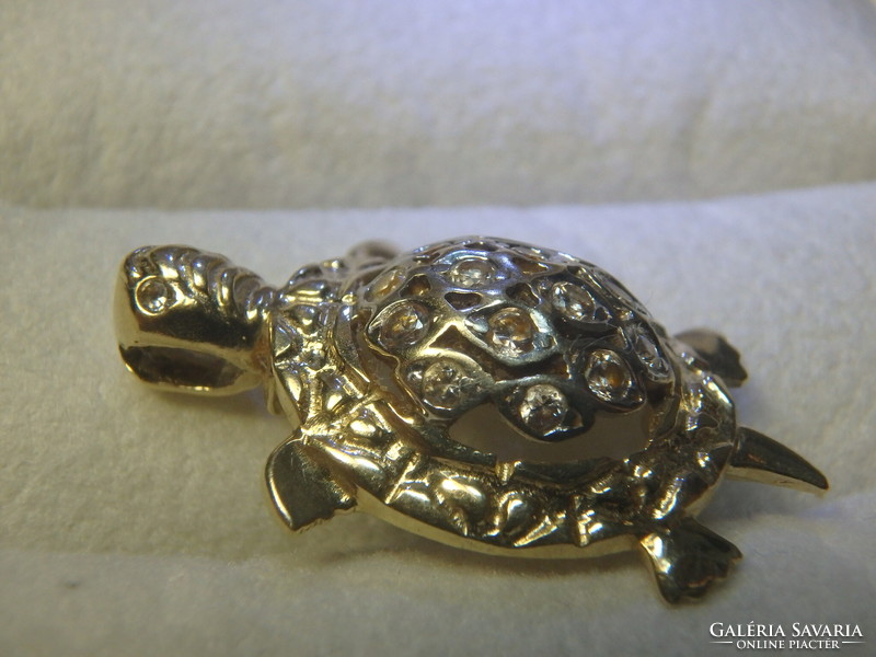 14K bicolor gold turtle pendant with zirconia.