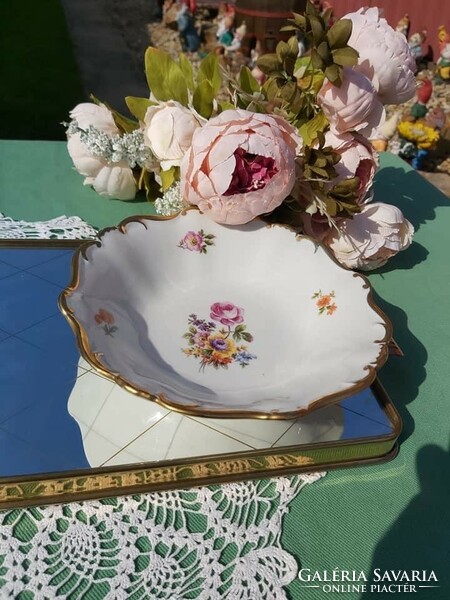 Beautiful porcelain centerpiece offering floral