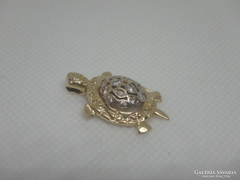 14K bicolor gold turtle pendant with zirconia.