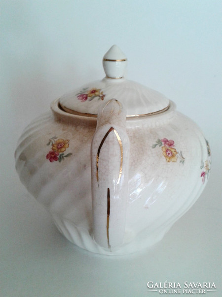 Old granite flower teapot spout