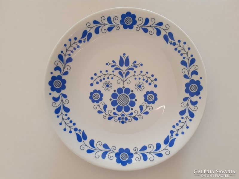 Old lowland porcelain wall plate with floral Hungarian blue folk pattern