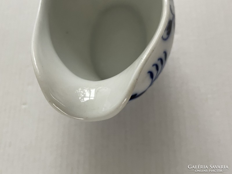 Old, vintage German porcelain saucer with onion pattern (zwiebelmuster).